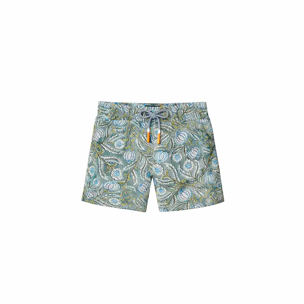 Lison Paris boys’ floral swim shorts with green and blue pattern on white background