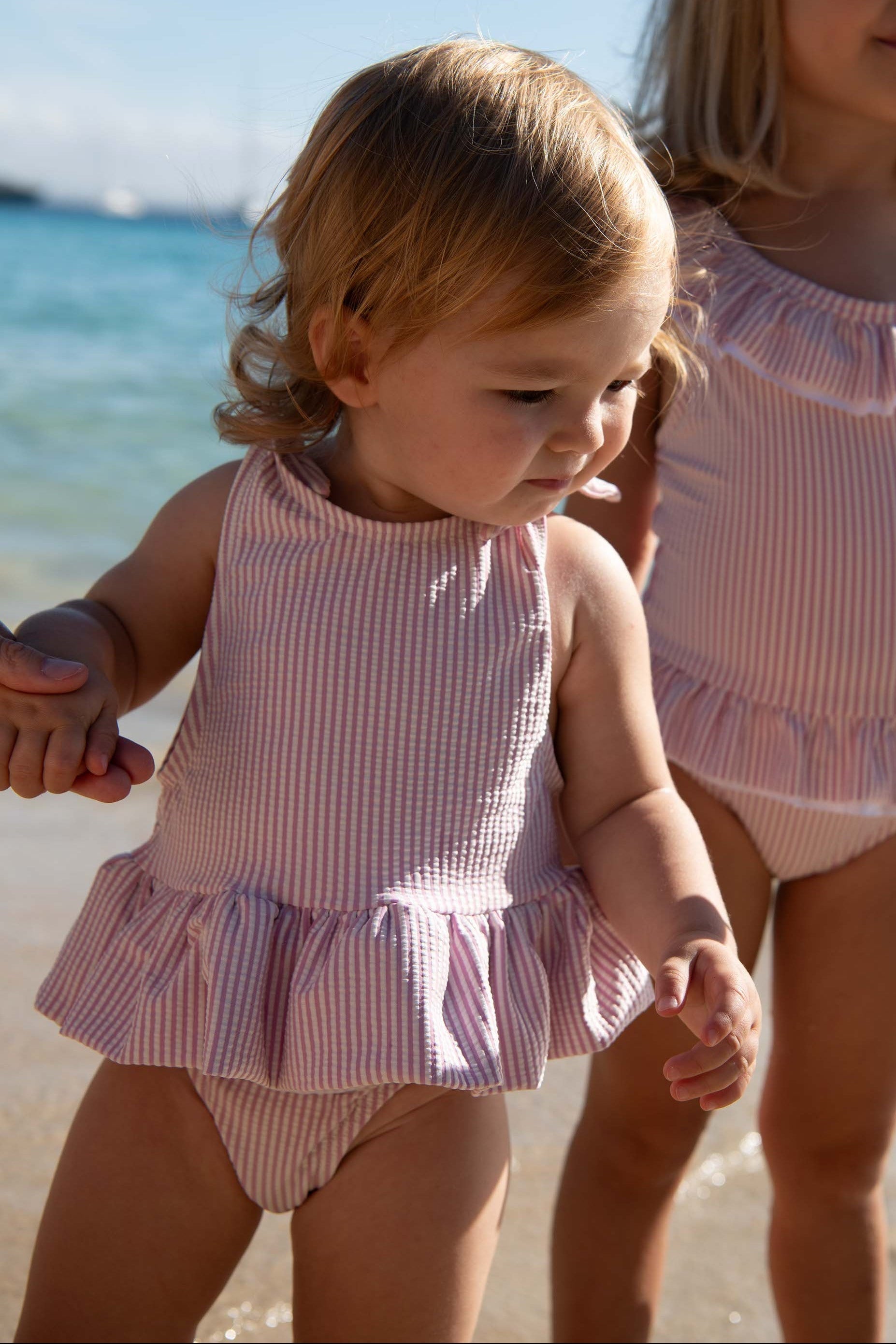 Girls' onepiece swimsuit with lilac striped ruffles | GUIMAUVE BABY