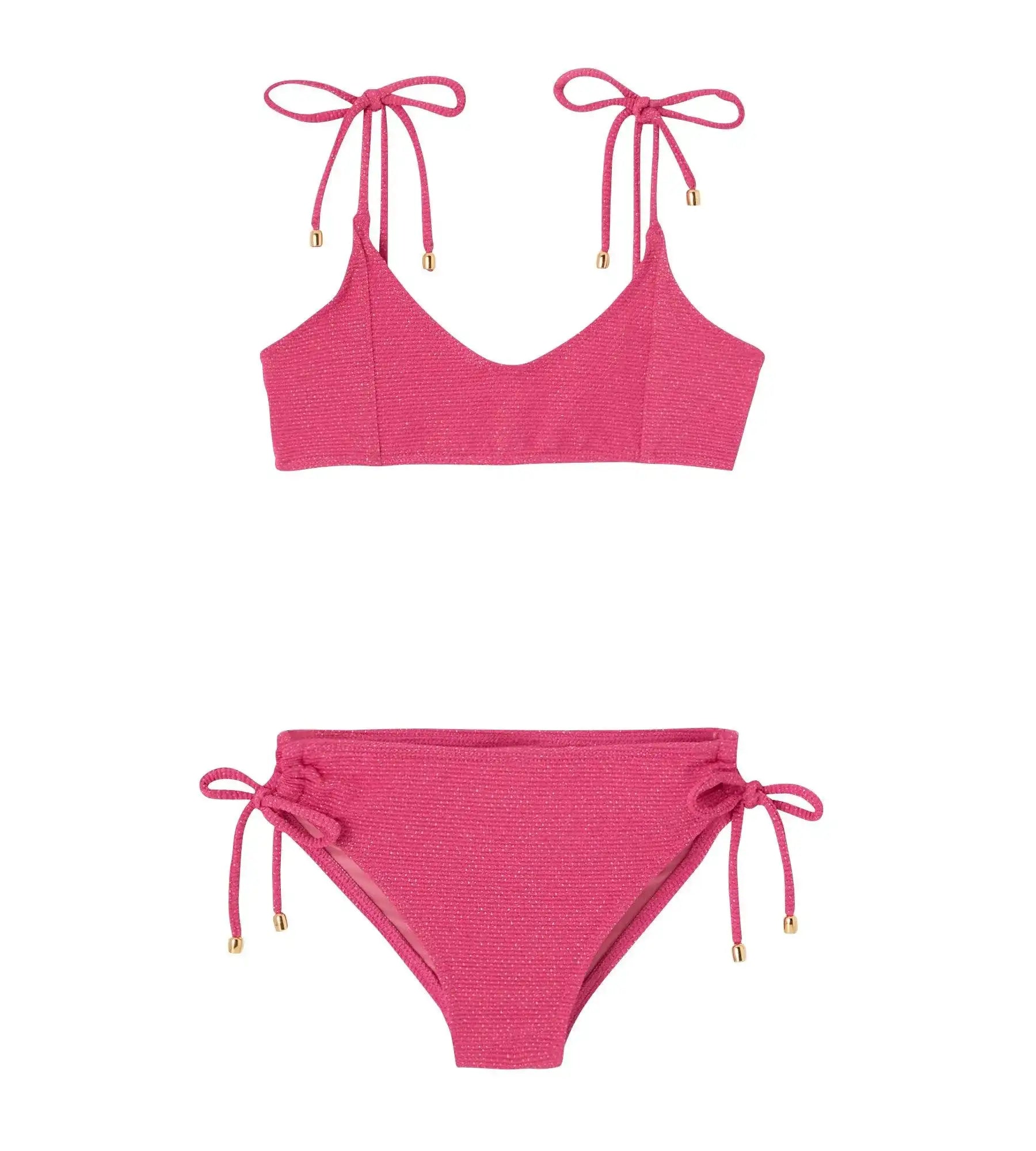Raspberry pink textured girls' bikini with tie straps, Lison Paris swimwear collection.