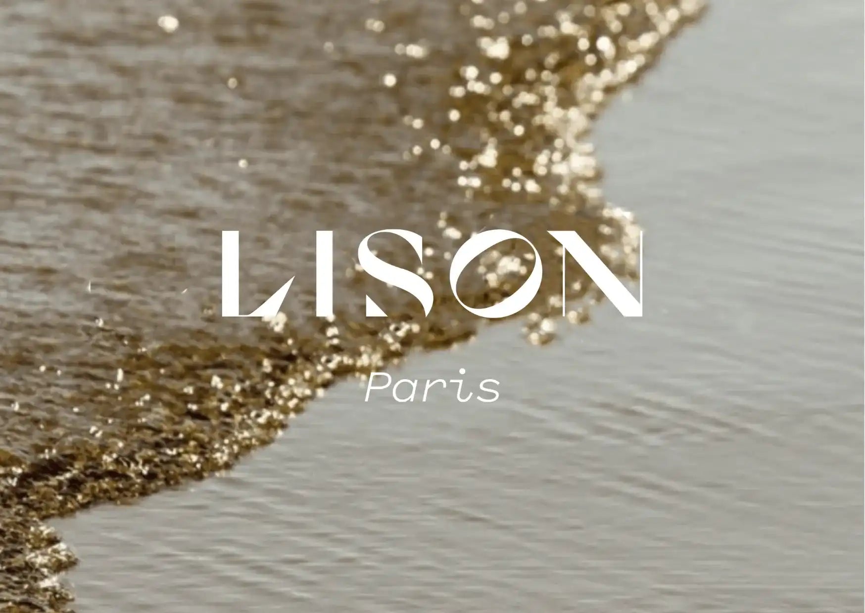 Lison Paris logo over a sunlit beach wave, representing UV swimwear and beachwear brand.