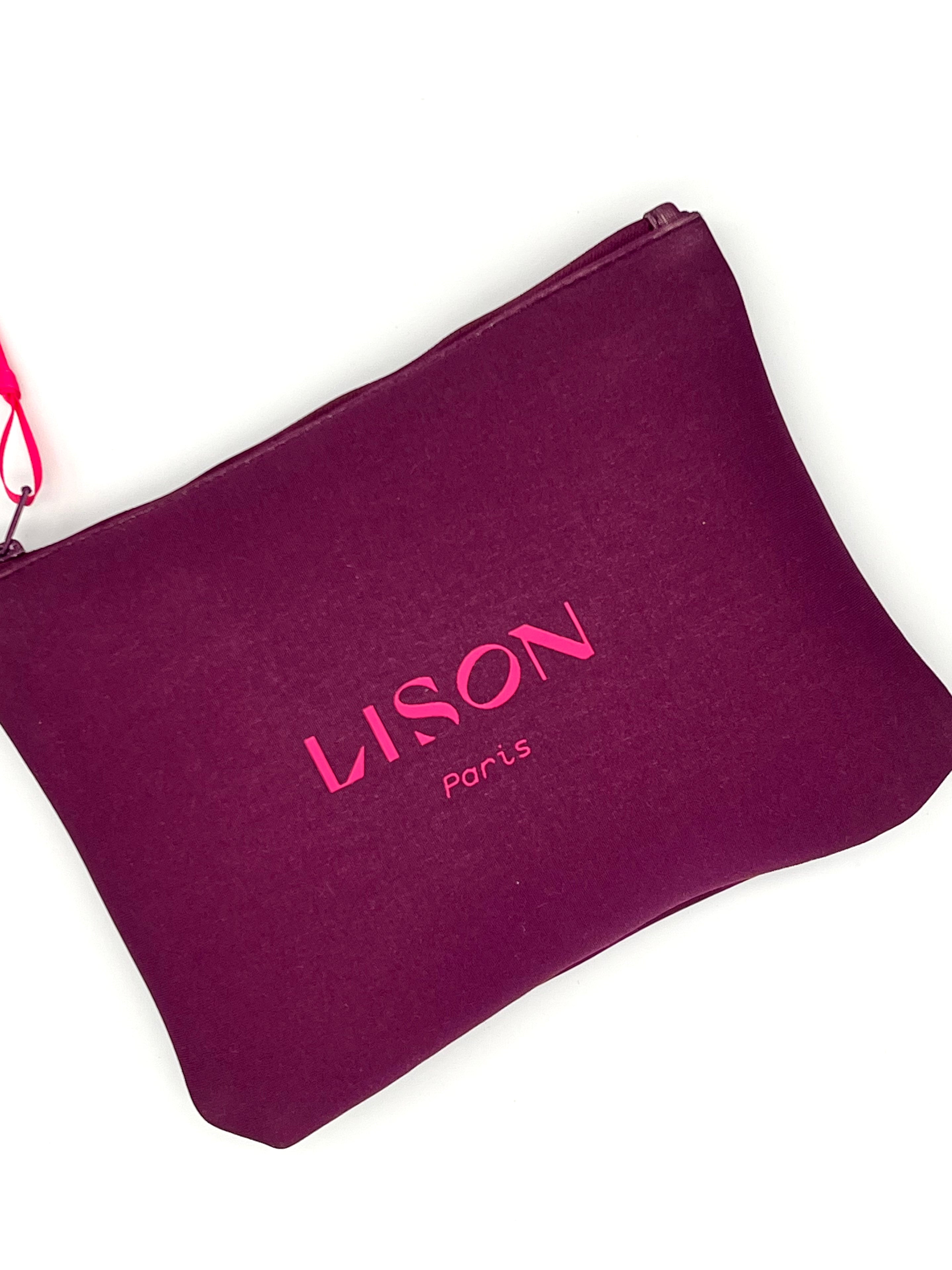 Purple Lison Paris branded pouch with pink lettering on white background