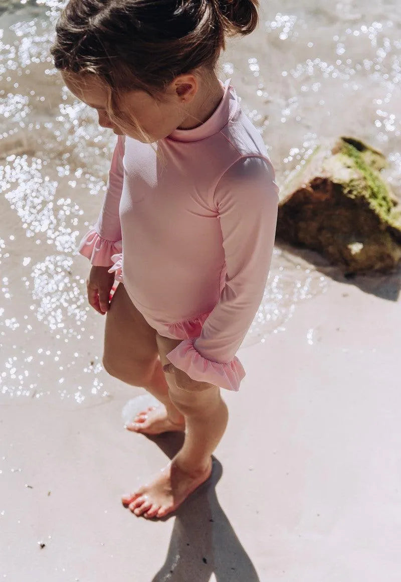 Maillot bébé fille Anti-UV, manches longues rose pâle| BORA BORA BEBE - Lison Paris