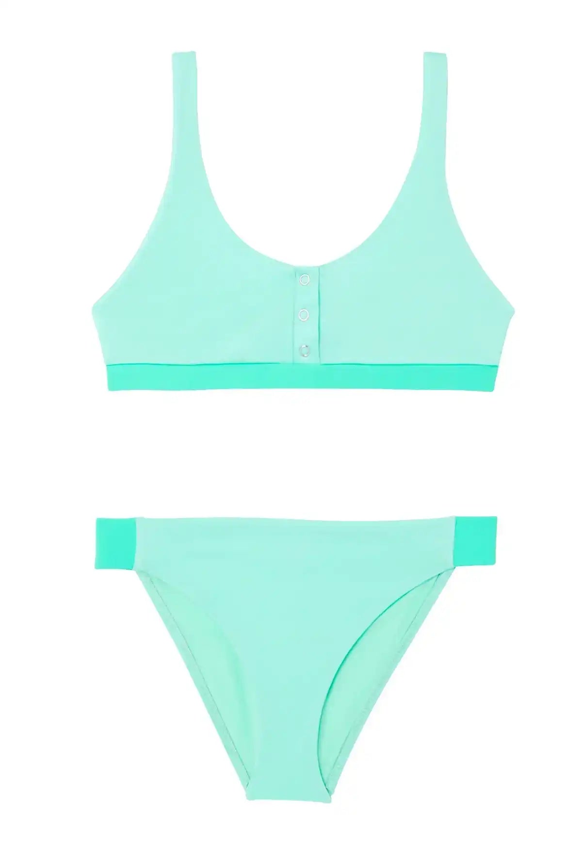 Aqua green two-piece girl's UV-protective swimsuit from Lison Paris, laid flat on white.