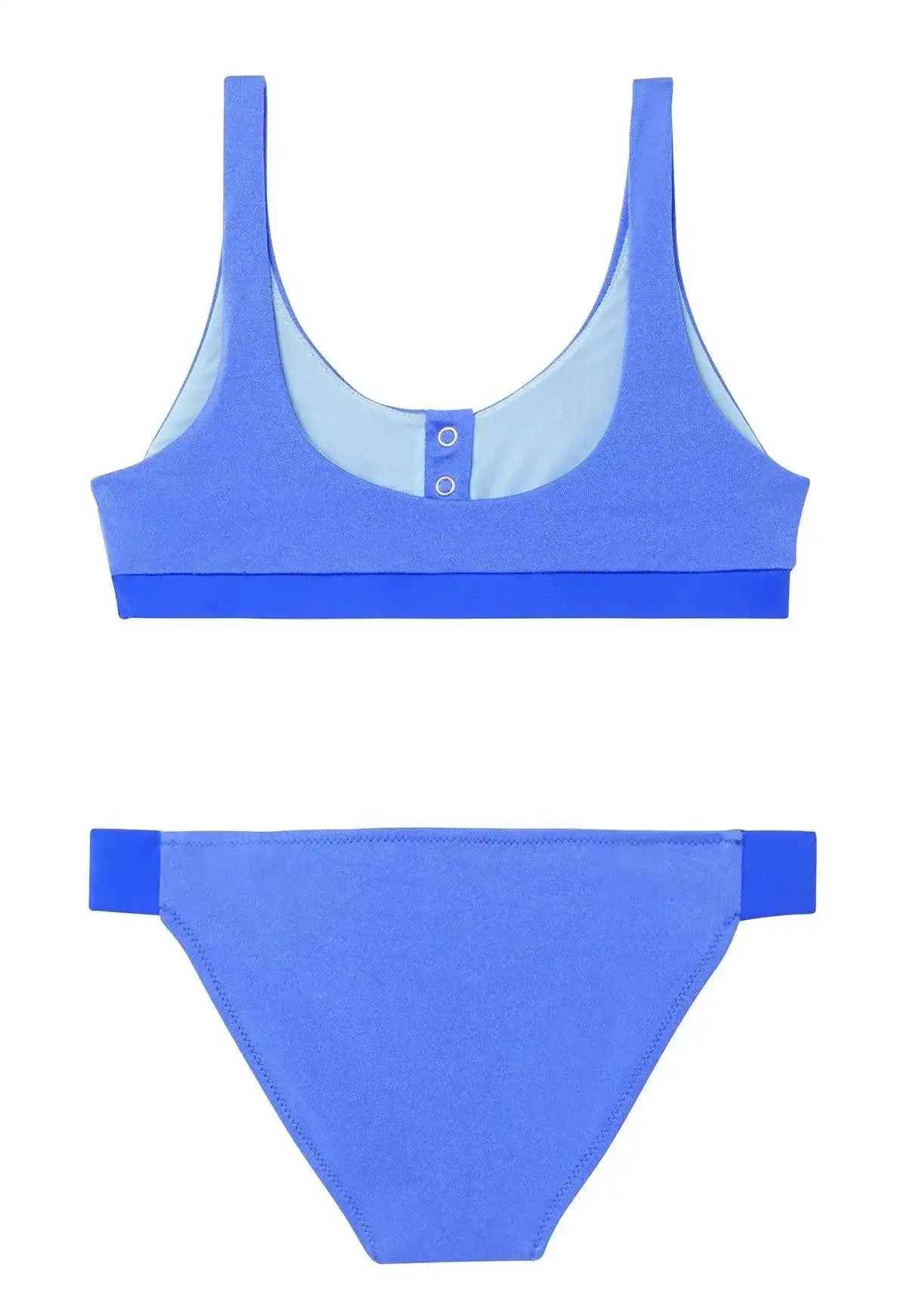 Girls' blue two-piece UV protection swimsuit by Lison Paris, front view, flat lay