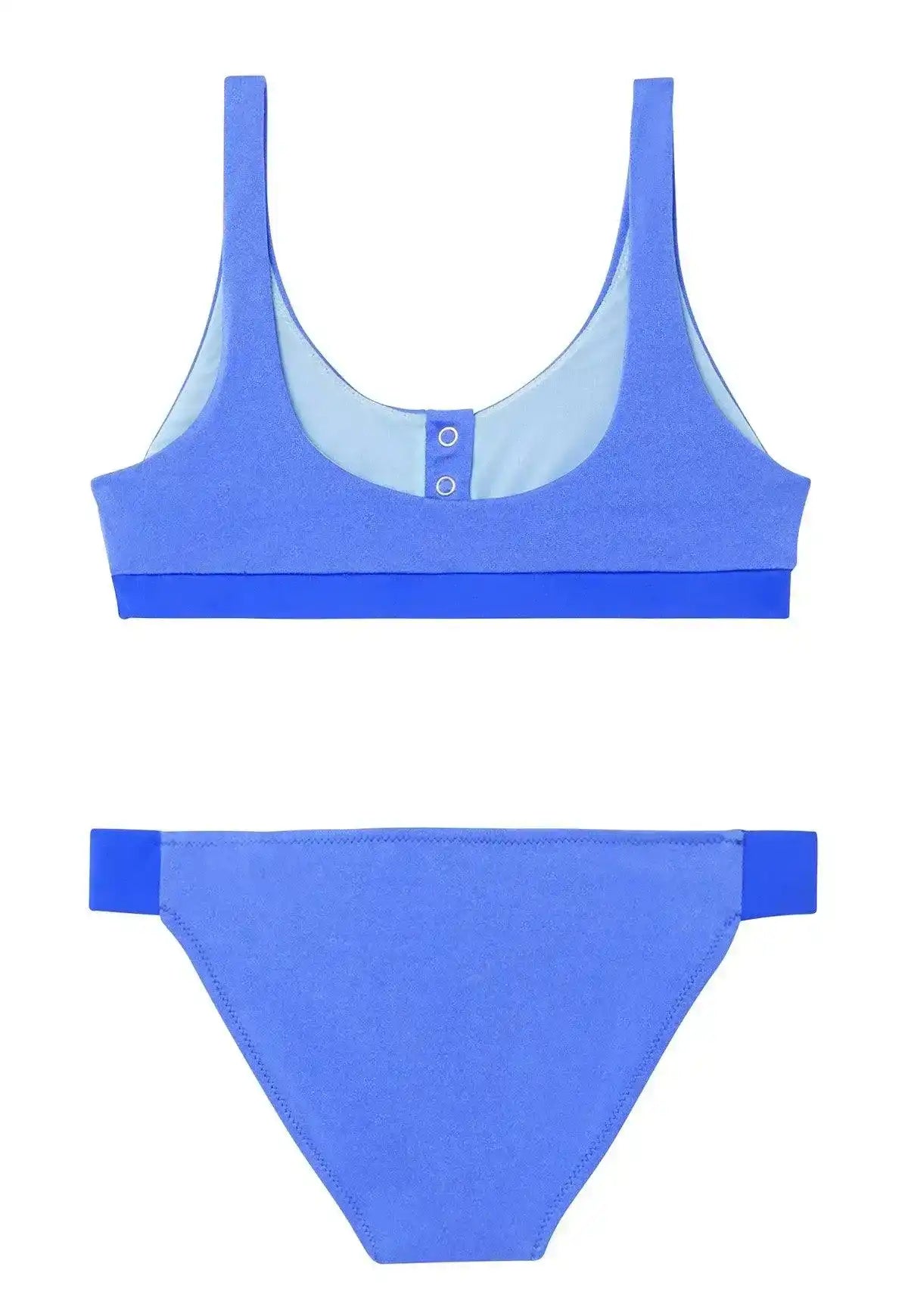 Girl's two-piece blue UV-protection swimsuit with wide straps and button detail on the top.