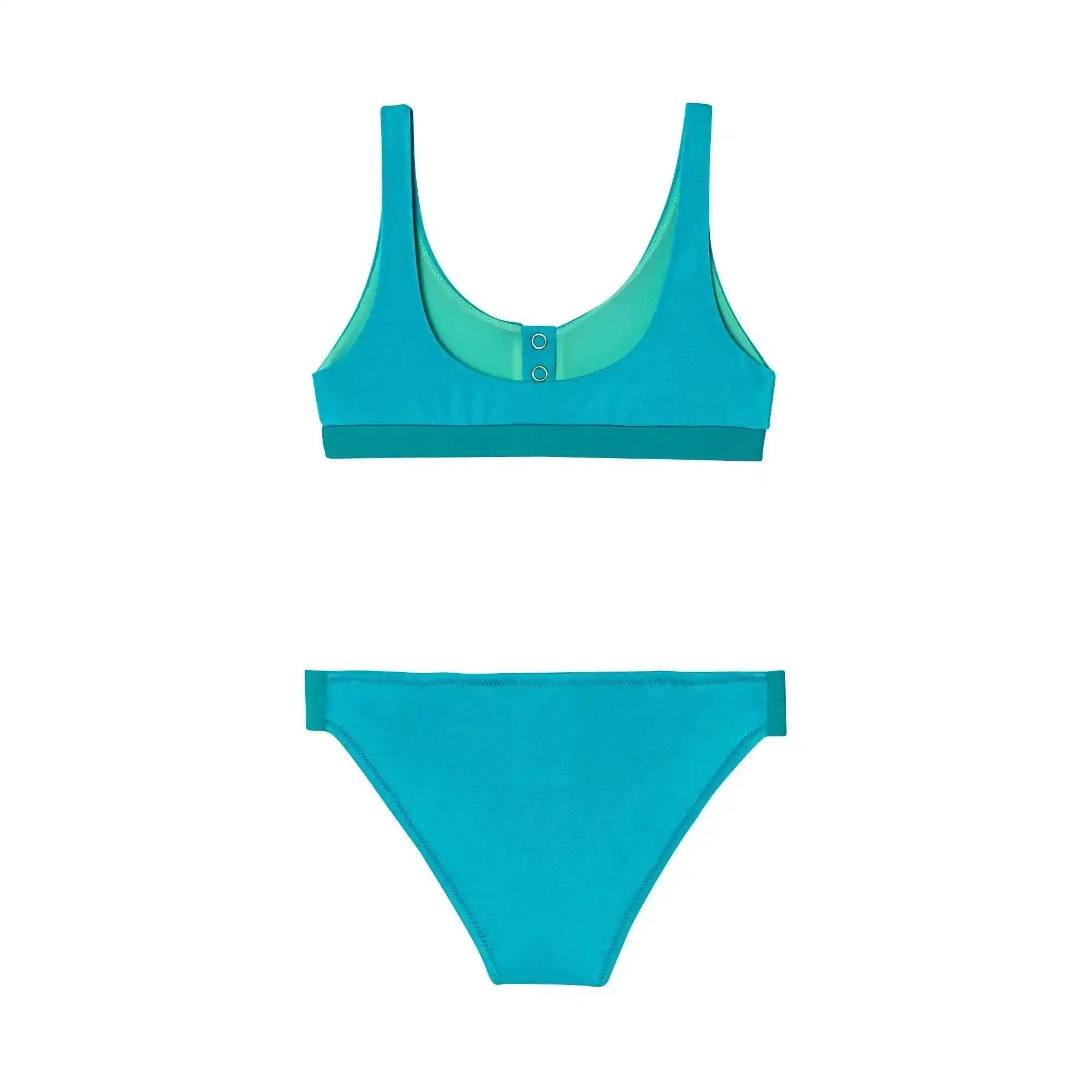 Girl's emerald green two-piece anti-UV swimsuit by Lison Paris on white background