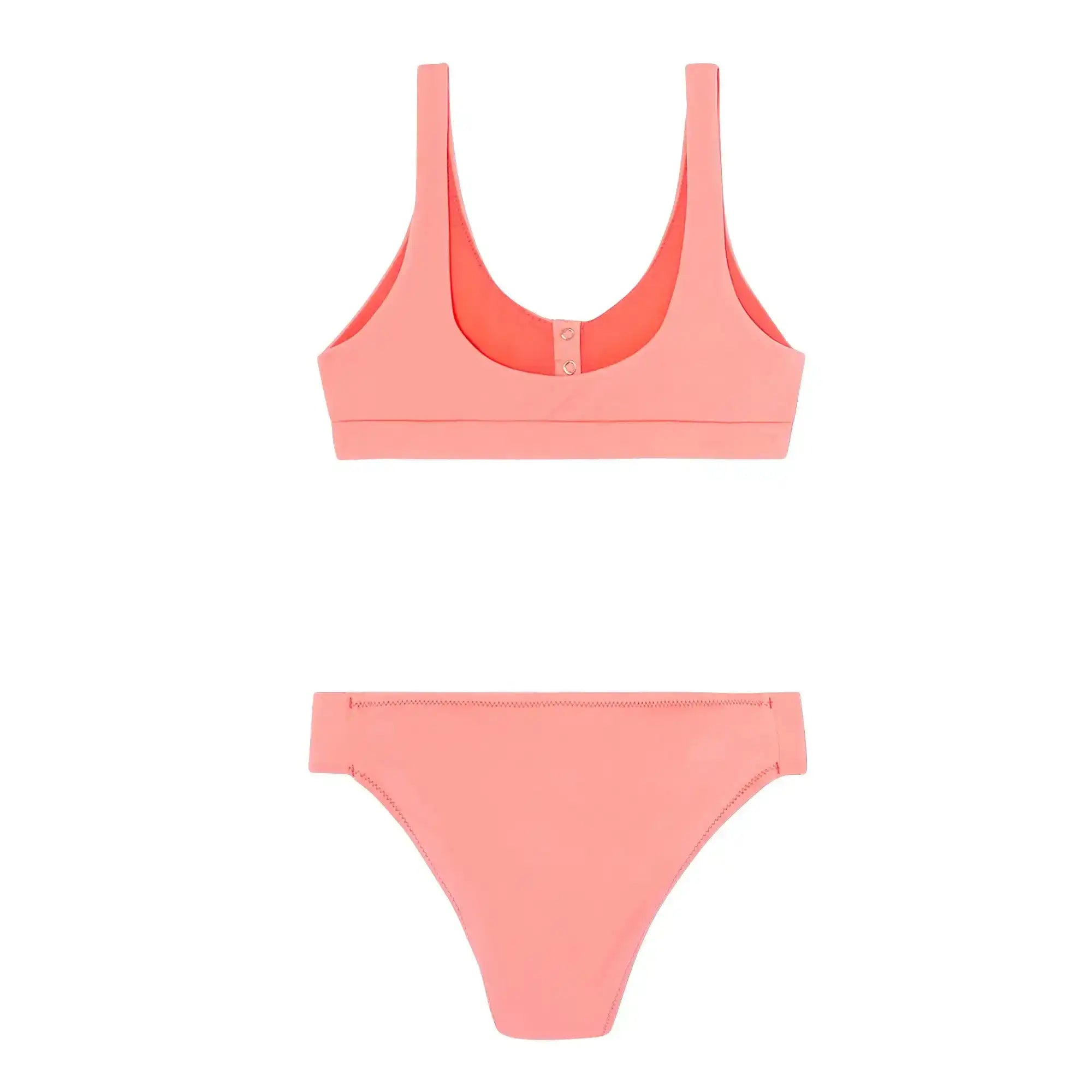 Girls' two-piece swimsuit in neon pink, UV protection, flat lay on white background