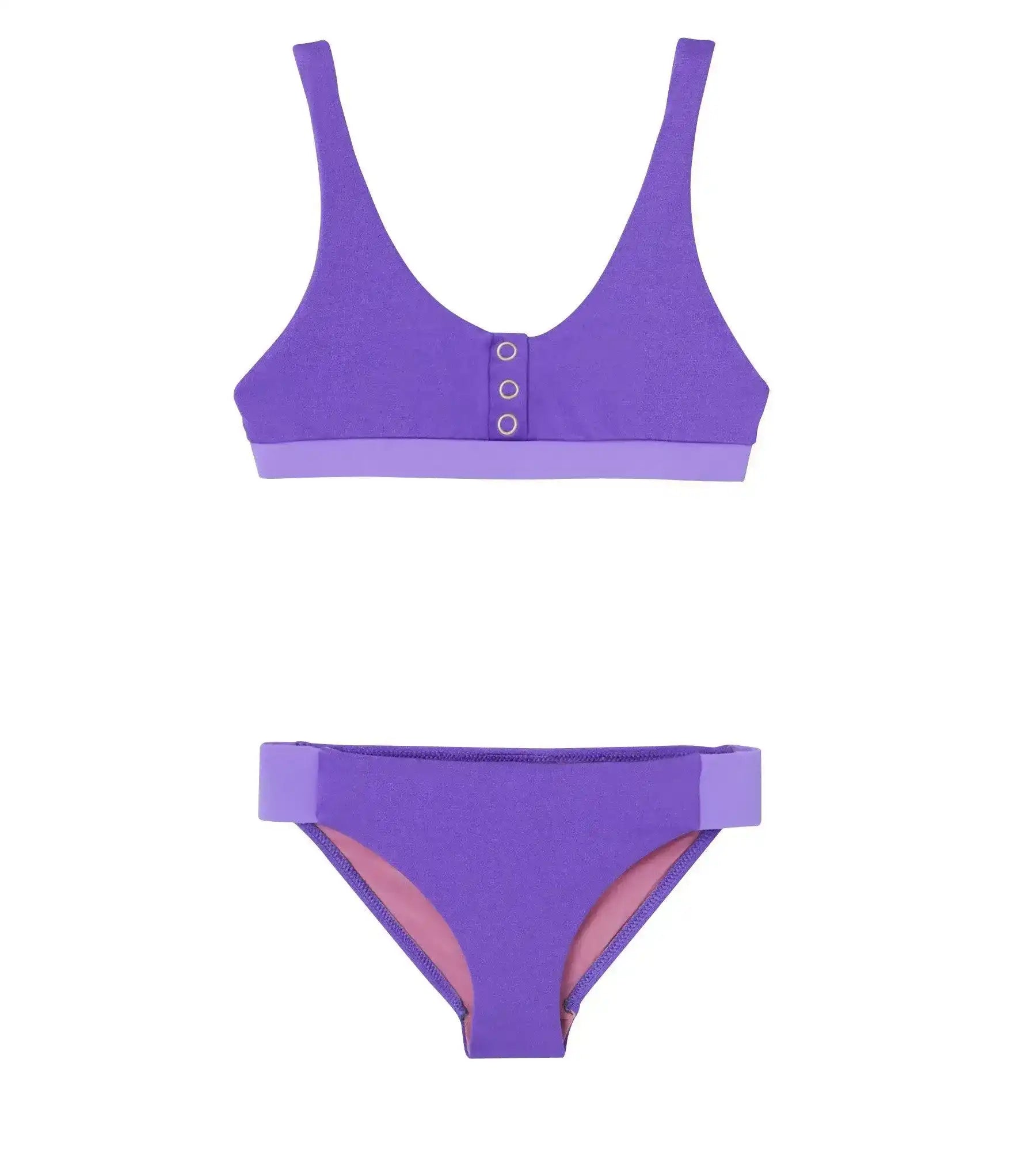 Purple two-piece girls' UV protection swimsuit with button detail, laid flat on white background
