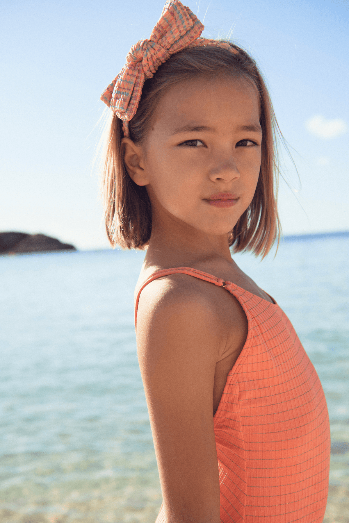 Girls' one-piece swimsuit, neon coral | CALYPSO 1P