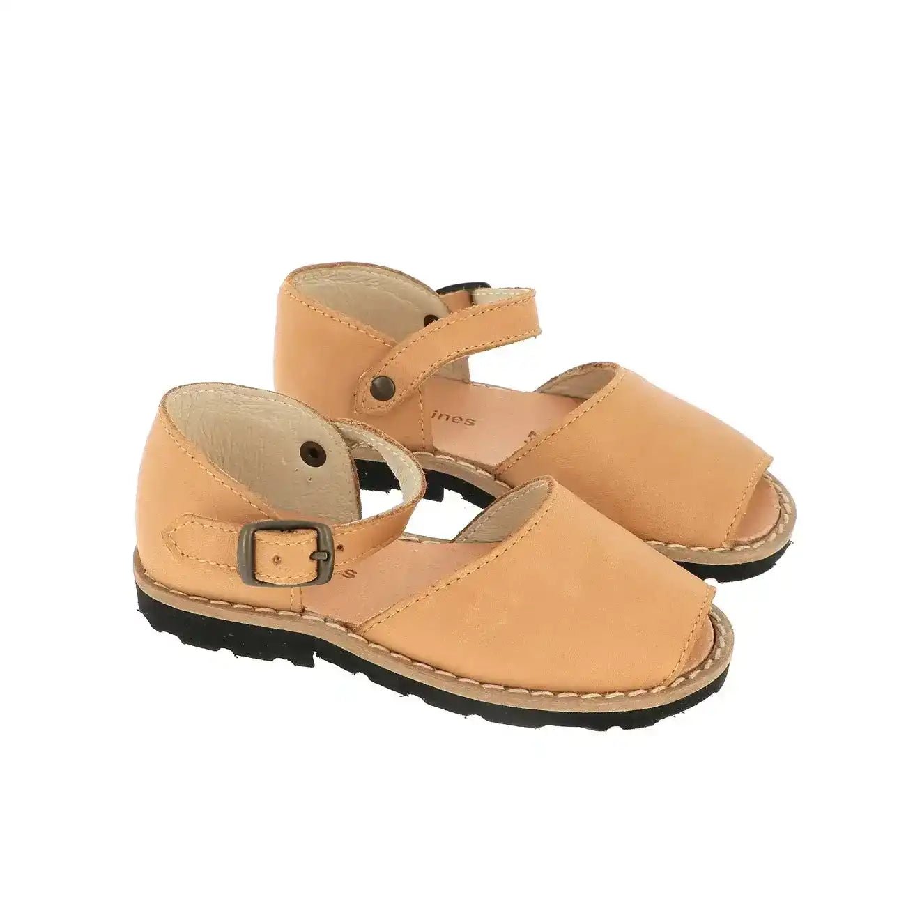 Natural leather buckle sandals for children with closed heel and open toe on white background